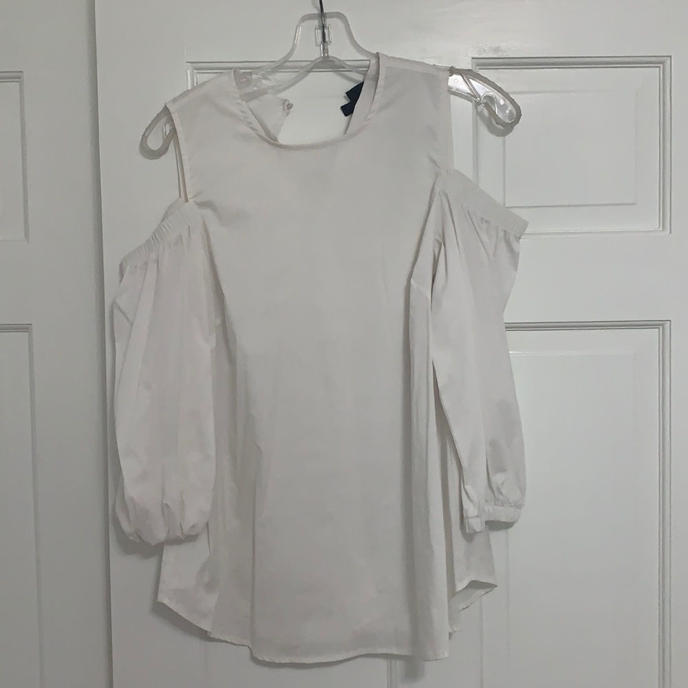 Nice blouse with open shoulder. Quarter length sleeve size small.